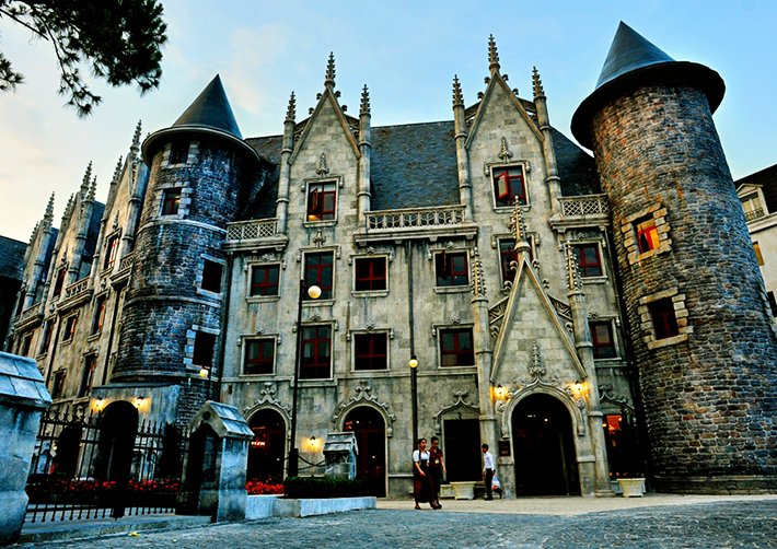 French Village, a European-style area featuring cobblestone streets, architecture, and open squares.