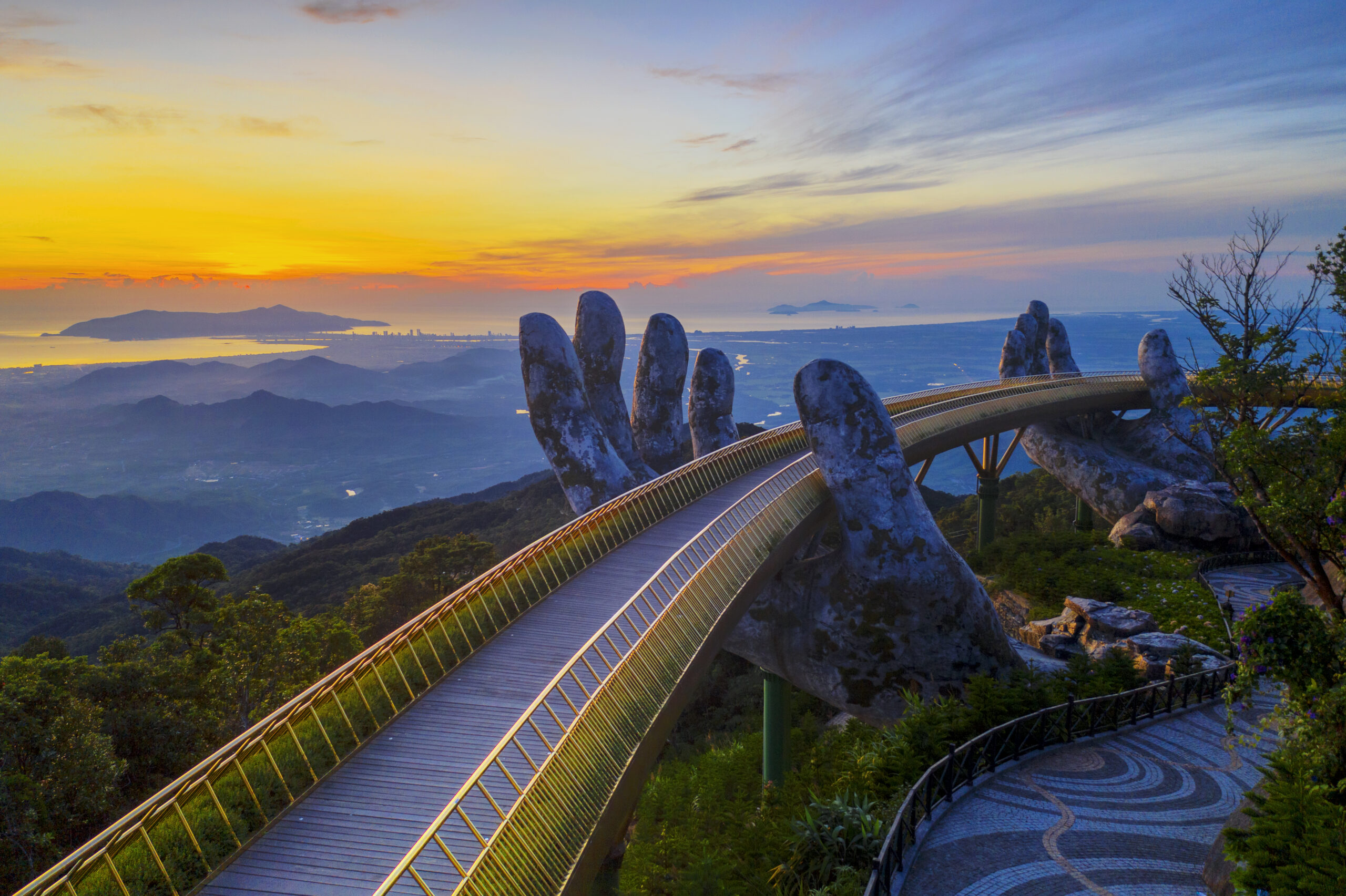 A breathtaking panoramic view from the Golden Bridge in Ba Na Hills at sunset
