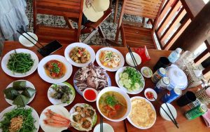 You’ll enjoy a freshly prepared local lunch, often served at a beachside restaurant or simple open-air setup.
